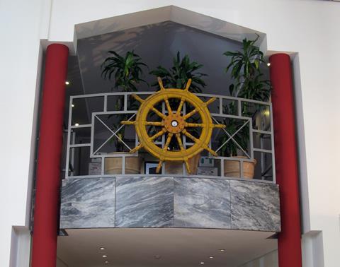 The bridge and ship's wheel dominate the entrance to Lowri Evans' maritime and fisheries headquarters in Brussels. Credit: TW : EEC Photos