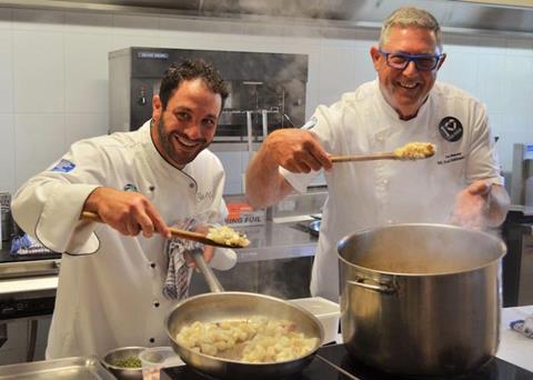 Chefs Peter Manifis and Don Hancey prepare a magnificent squid risotto for the teachers' lunch