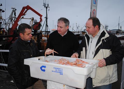 From left to right, Victor West, Richard Lochhead and Sandy West on the quayside at Buckie