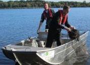 Environment Agency officers Nick Beardmore and Tom Howard on the Melusina's maiden voyage
